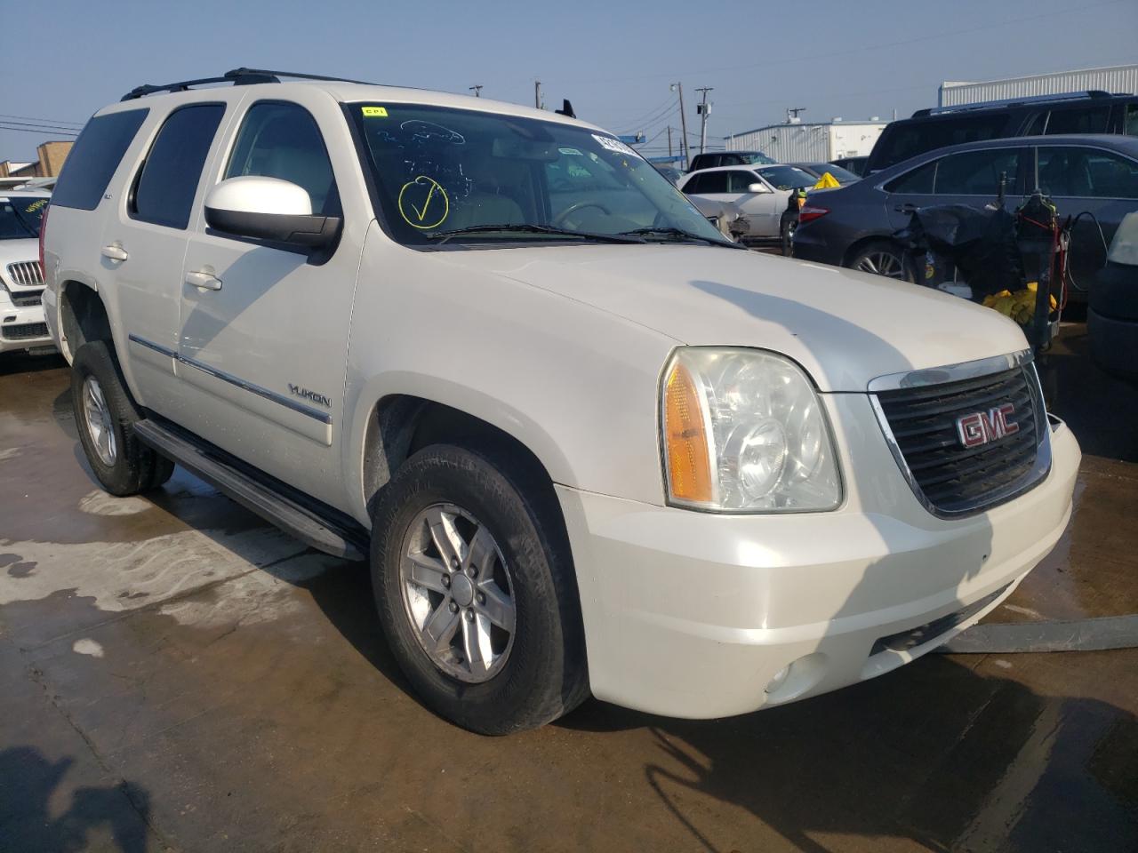 GMC YUKON SLT 2011 with VIN 1GKS2CE02BR356918 - Photo from auction