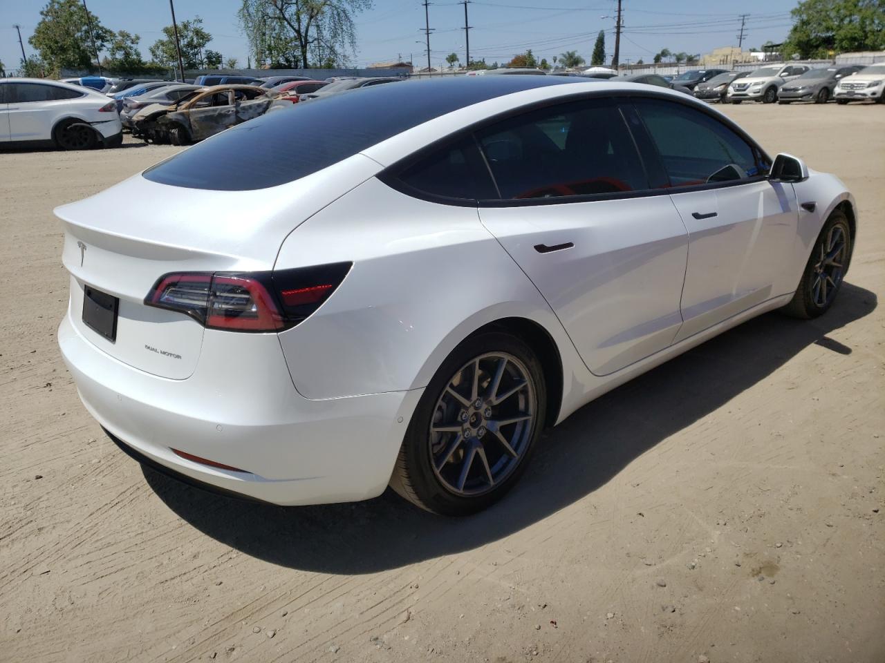 Photo 4 from auction – 2021 TESLA MODEL 3 with VIN 5YJ3E1EB7MF869653