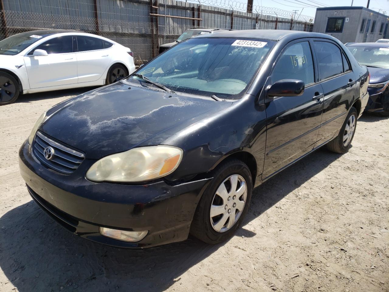 Photo 2 from auction – 2003 TOYOTA COROLLA CE with VIN JTDBR32E730026009