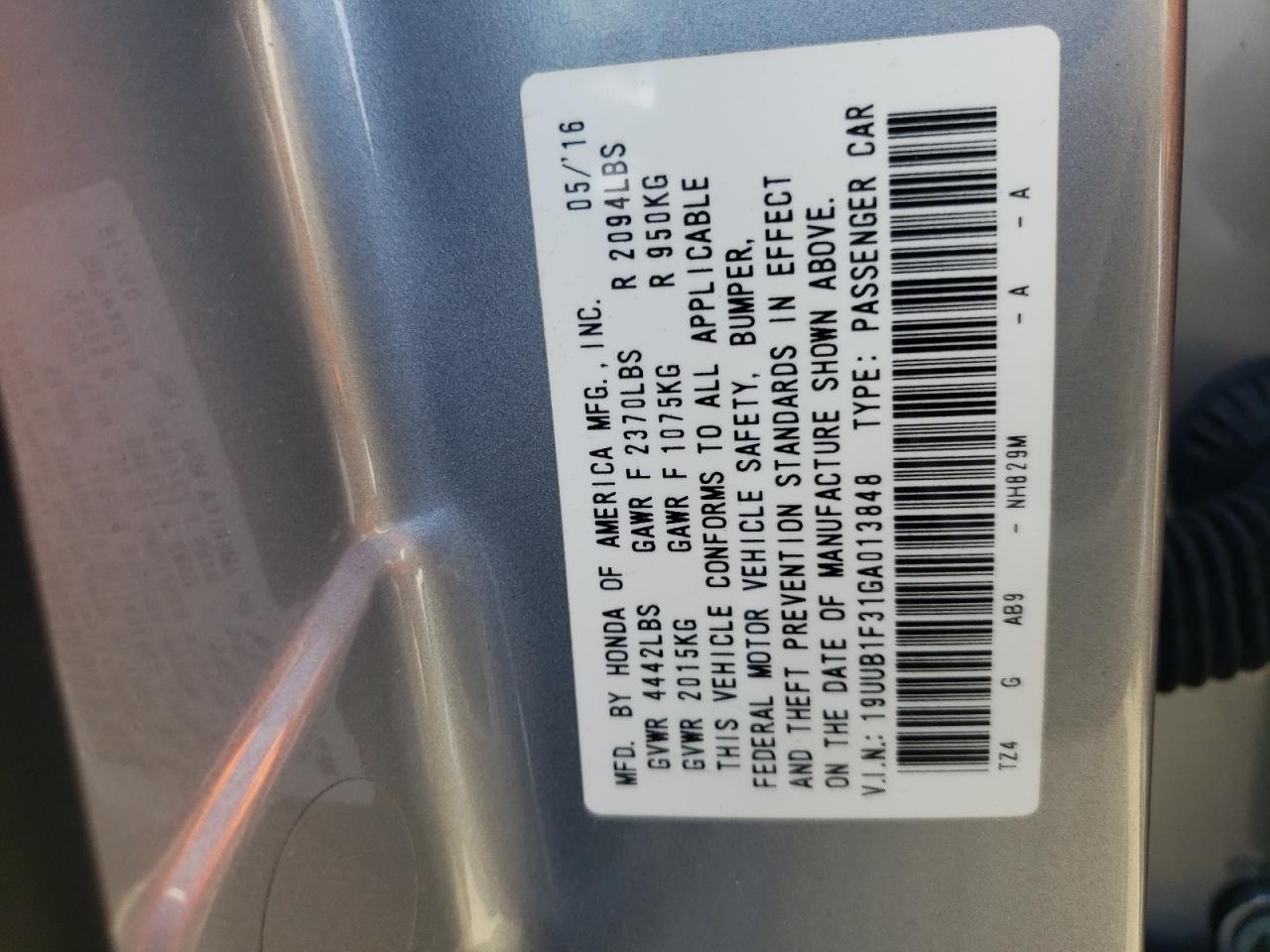 Photo 10 from auction – 2016 ACURA TLX with VIN 19UUB1F31GA013848