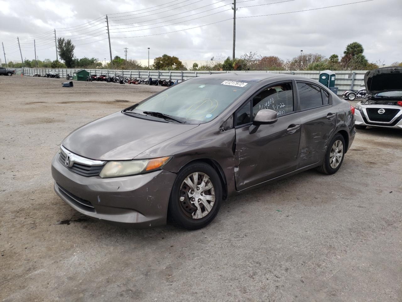 Photo 2 from auction – 2012 HONDA CIVIC LX with VIN 19XFB2F57CE036833