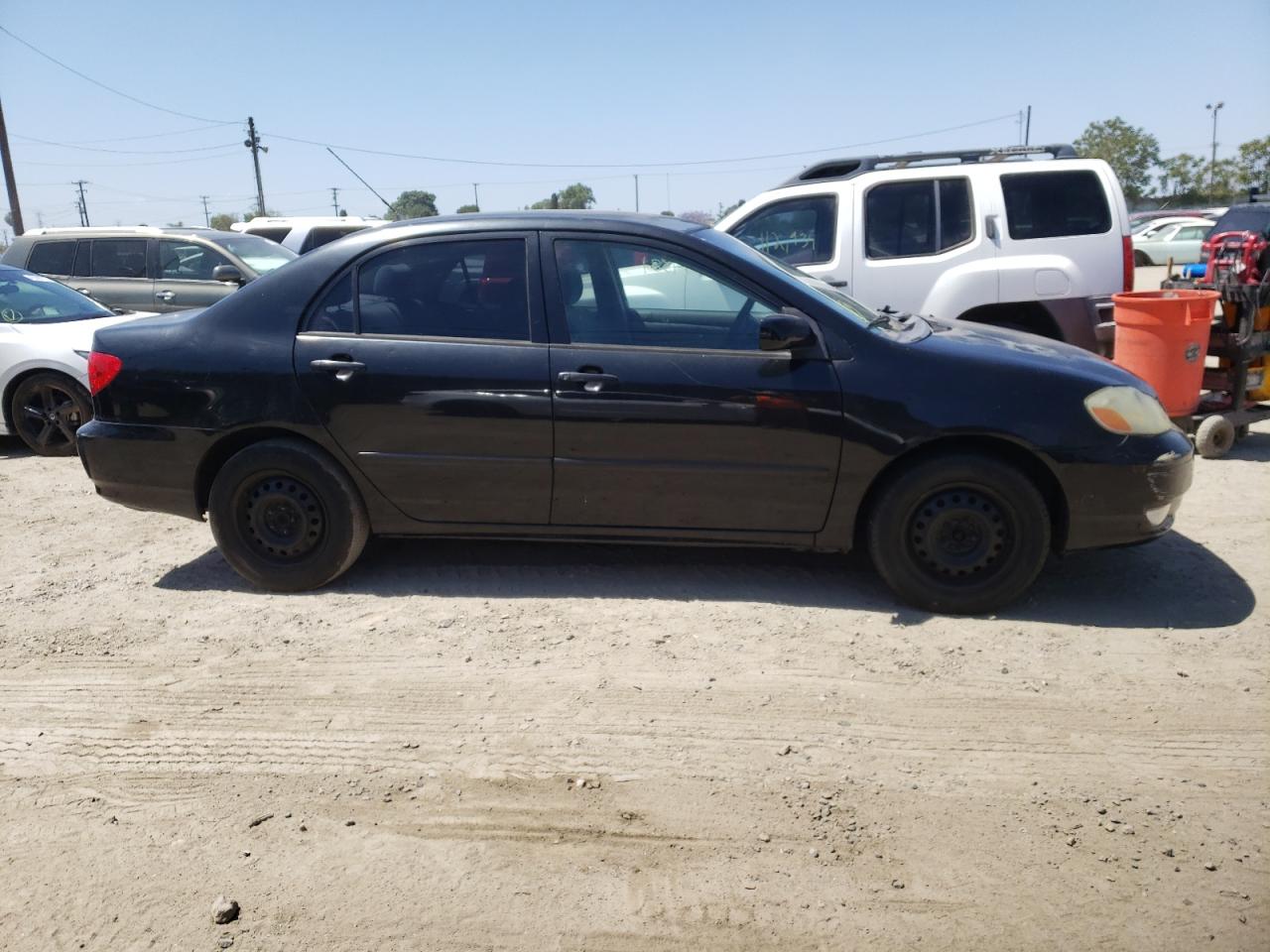 Photo 9 from auction – 2003 TOYOTA COROLLA CE with VIN JTDBR32E730026009