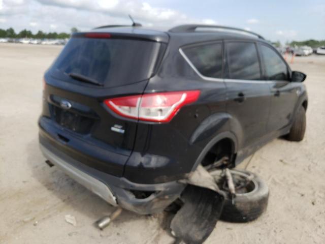 Photo 4 from auction – 2016 FORD ESCAPE SE with VIN 1FMCU9GX4GUC46542