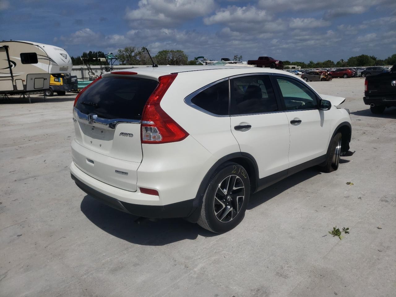 Photo 4 from auction – 2016 HONDA CR-V SE with VIN 5J6RM4H47GL042257