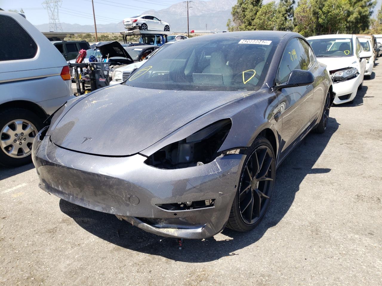 Photo 2 from auction – 2021 TESLA MODEL 3 with VIN 5YJ3E1EB0MF054677