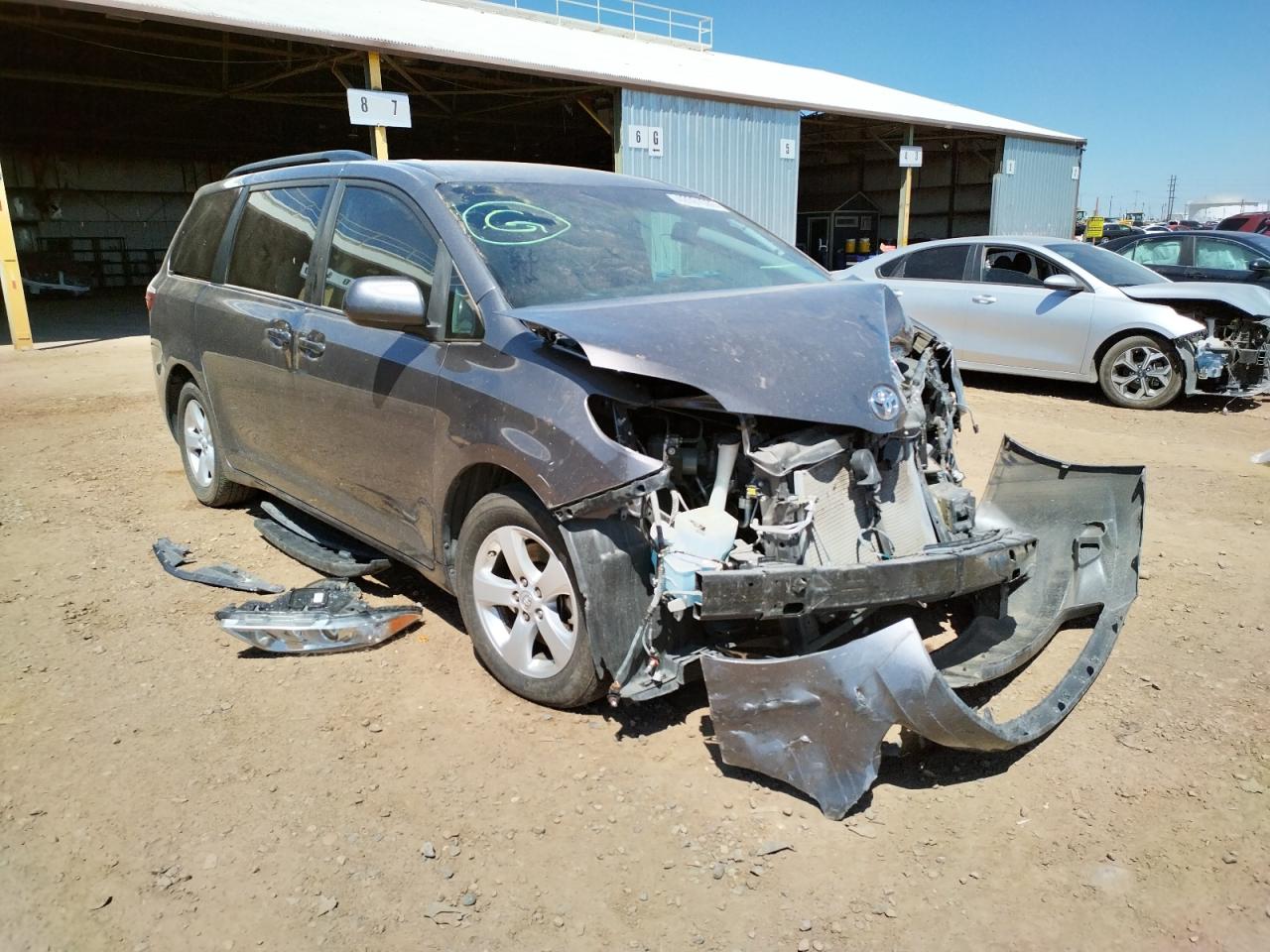 TOYOTA SIENNA LE 2015 with VIN 5TDKK3DCXFS662361 - Photo from auction