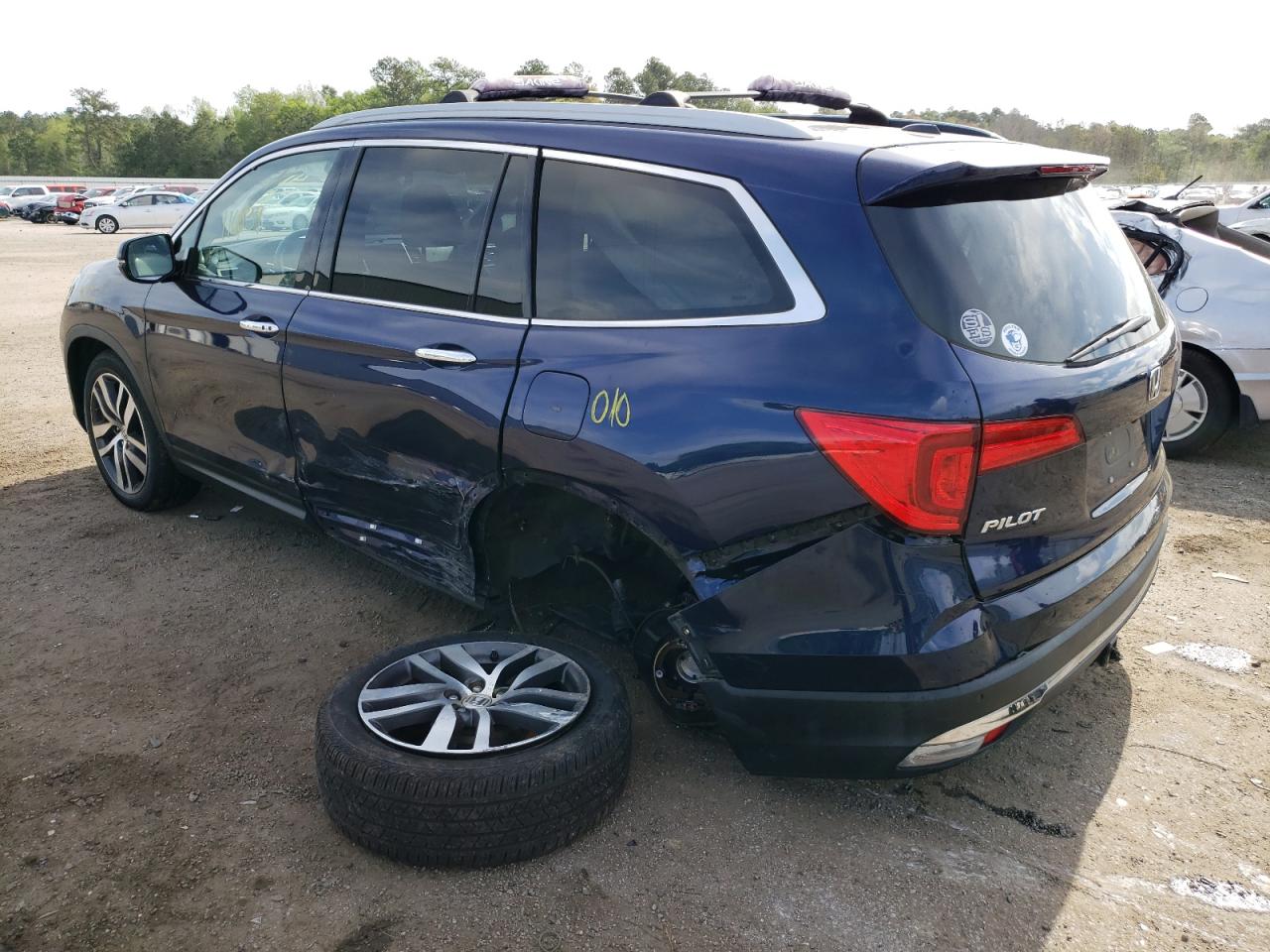 Photo 9 from auction – 2016 HONDA PILOT with VIN 5FNYF5H9XGB047887