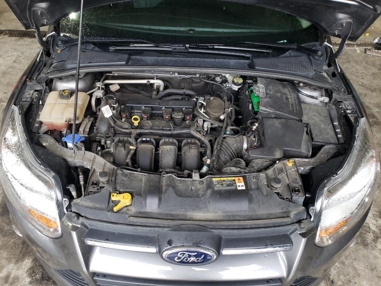 Photo 7 from auction – 2014 FORD FOCUS SE with VIN 1FADP3F24EL219708
