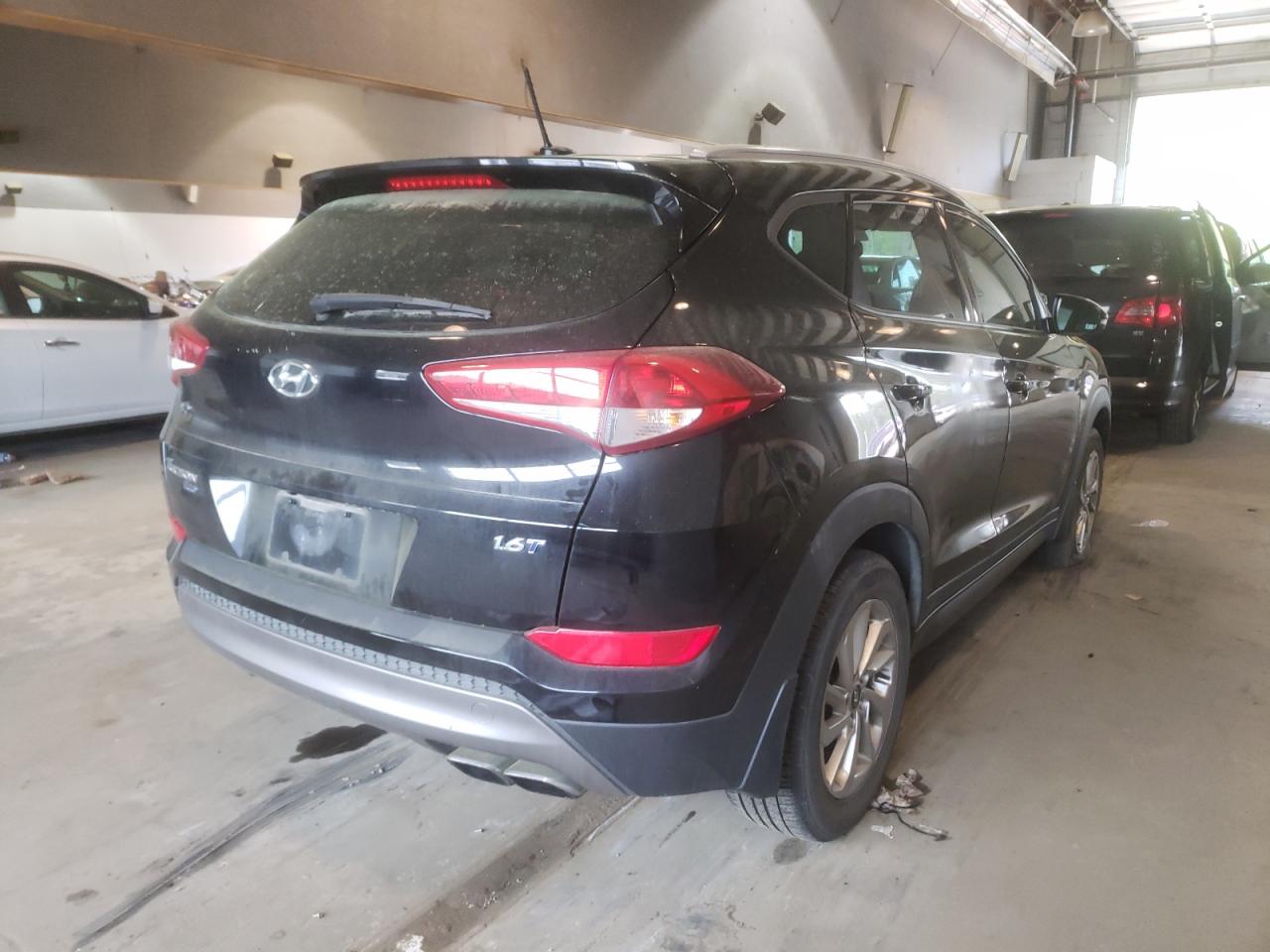 Photo 4 from auction – 2016 HYUNDAI TUCSON LIM with VIN KM8J33A20GU139878