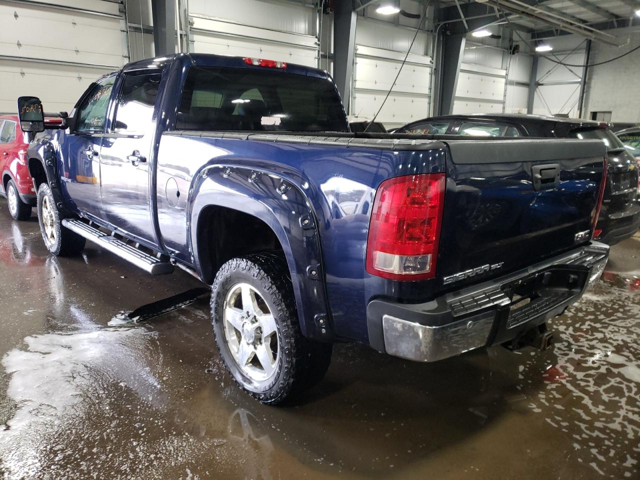 Photo 3 from auction – 2011 GMC SIERRA K25 with VIN 1GT121E81BF156986