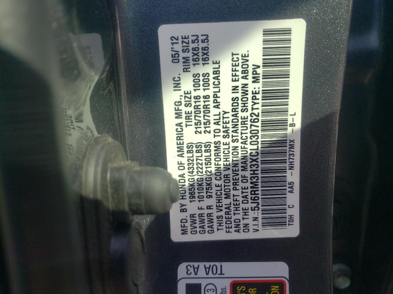 Photo 9 from auction – 2012 HONDA CR-V LX with VIN 5J6RM3H3XCL030762