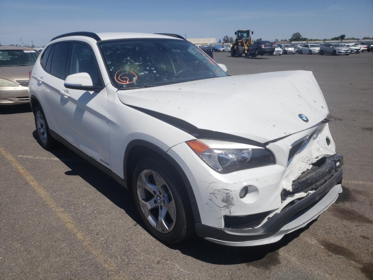 BMW X1 SDRIVE2 2015 with VIN WBAVM1C50FVW57980 - Photo from auction