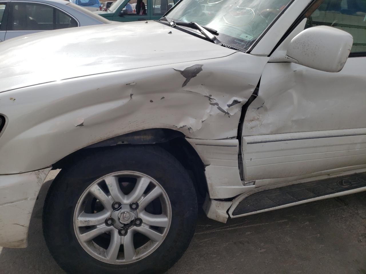 Photo 9 from auction – 2004 LEXUS LX 470 with VIN JTJHT00W943540057