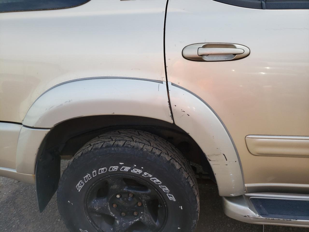 Фото 9 с аукциона – 2002 TOYOTA SEQUOIA SR с VIN 5TDBT44A12S083397