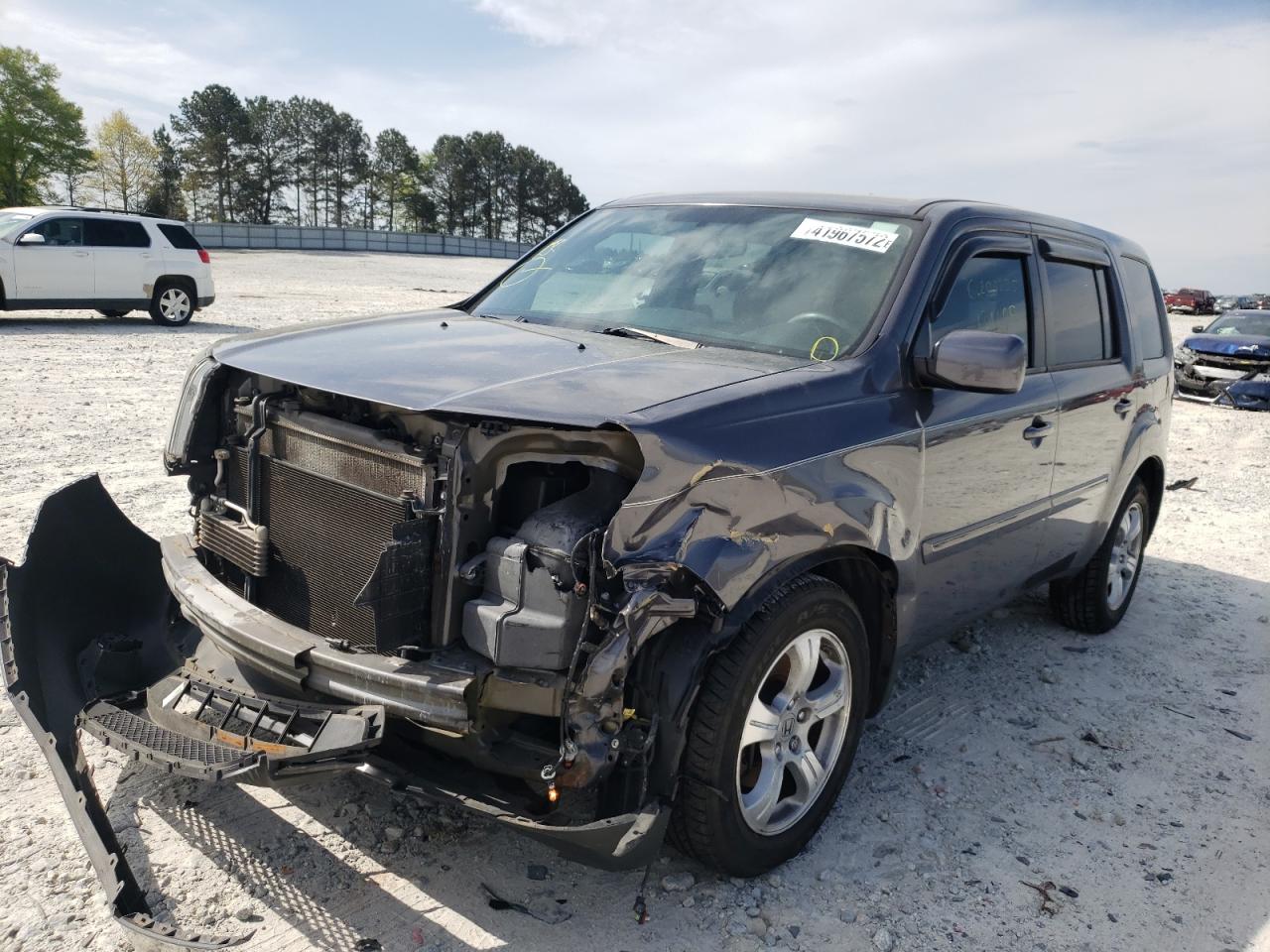 Photo 2 from auction – 2015 HONDA PILOT EX with VIN 5FNYF4H42FB030689