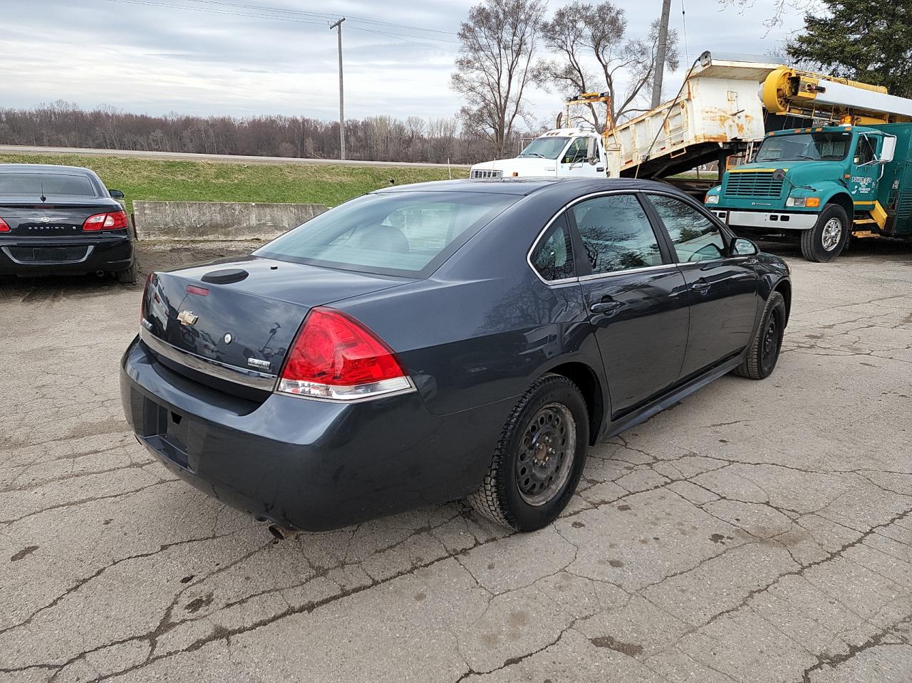 Photo 4 from auction – 2011 CHEVROLET IMPALA POL with VIN 2G1WD5EM2B1271942