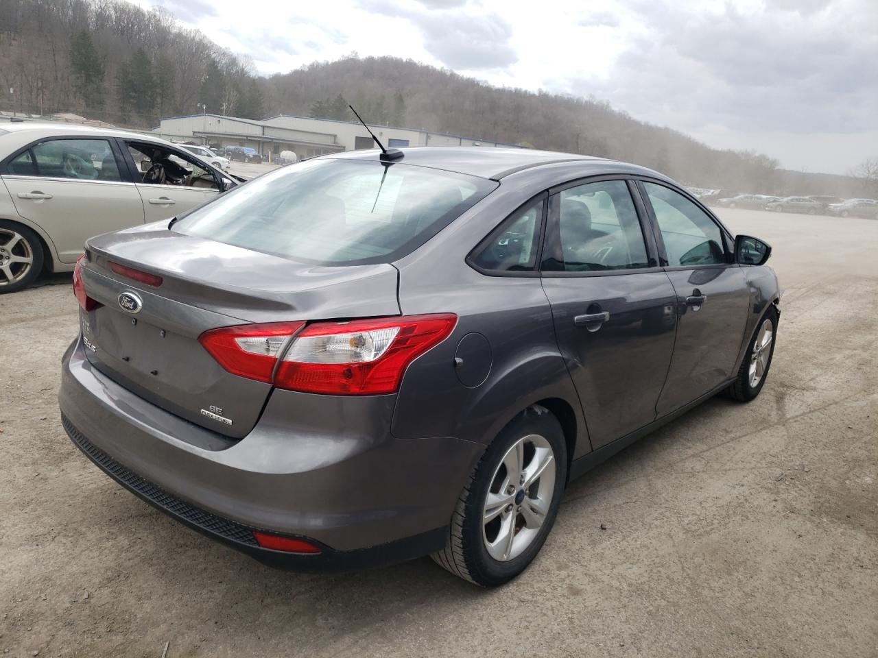 Photo 4 from auction – 2014 FORD FOCUS SE with VIN 1FADP3F2XEL235105