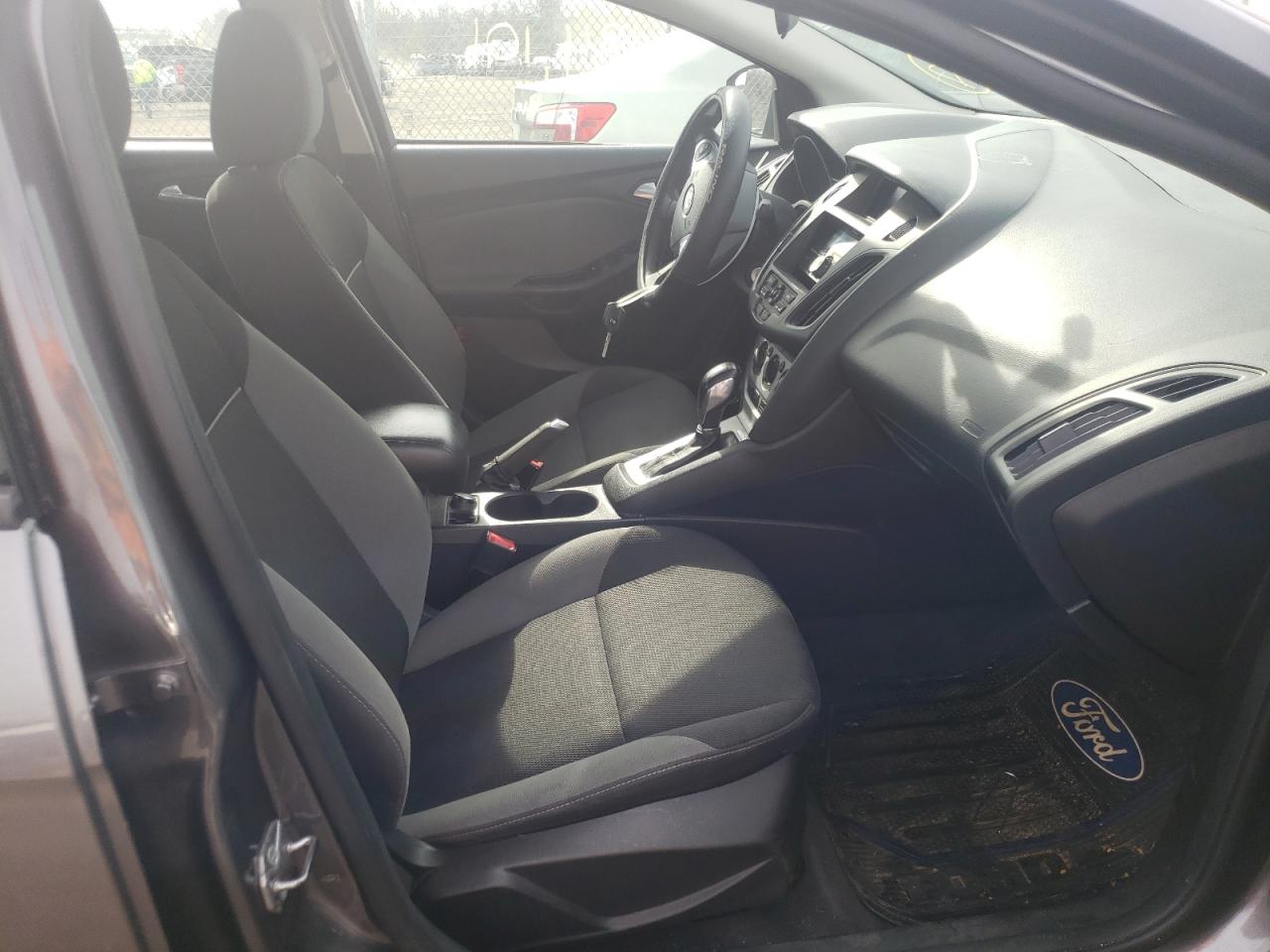 Photo 5 from auction – 2014 FORD FOCUS SE with VIN 1FADP3F21EL301427