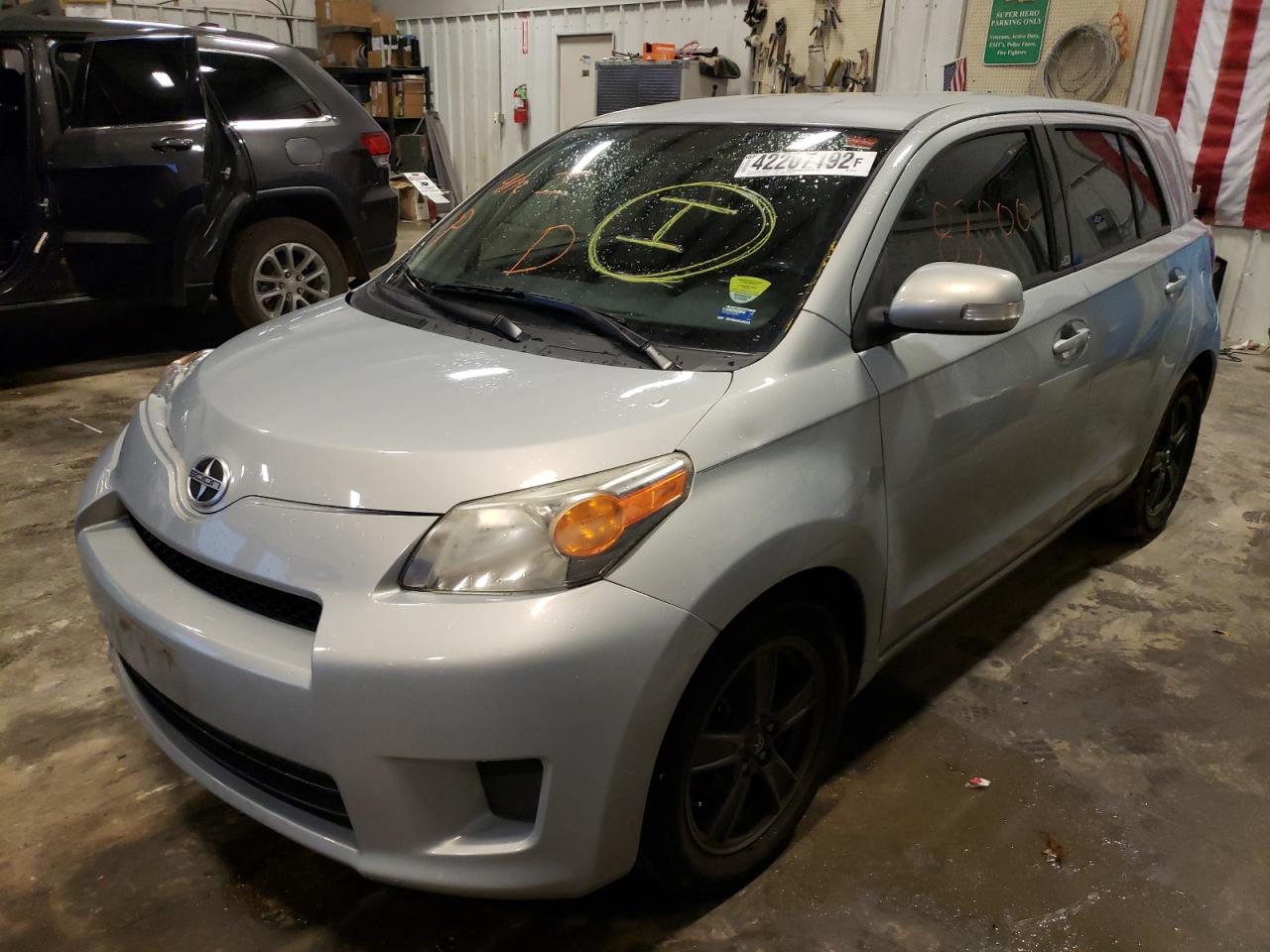 Photo 2 from auction – 2013 TOYOTA SCION XD with VIN JTKKUPB47D1038730
