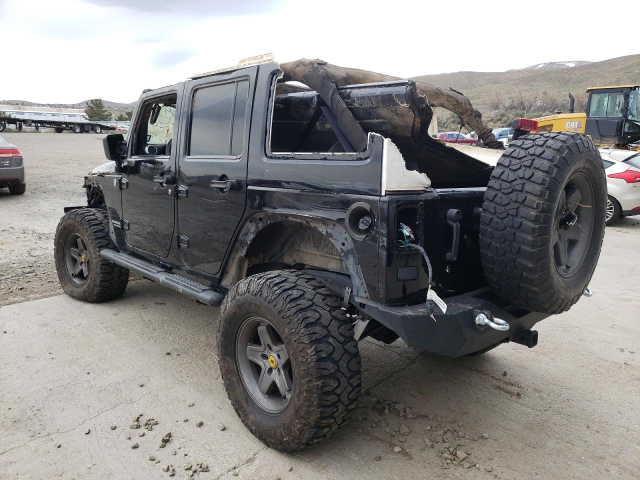 Photo 3 from auction – 2012 JEEP WRANGLER U with VIN 1C4BJWFG3CL104577