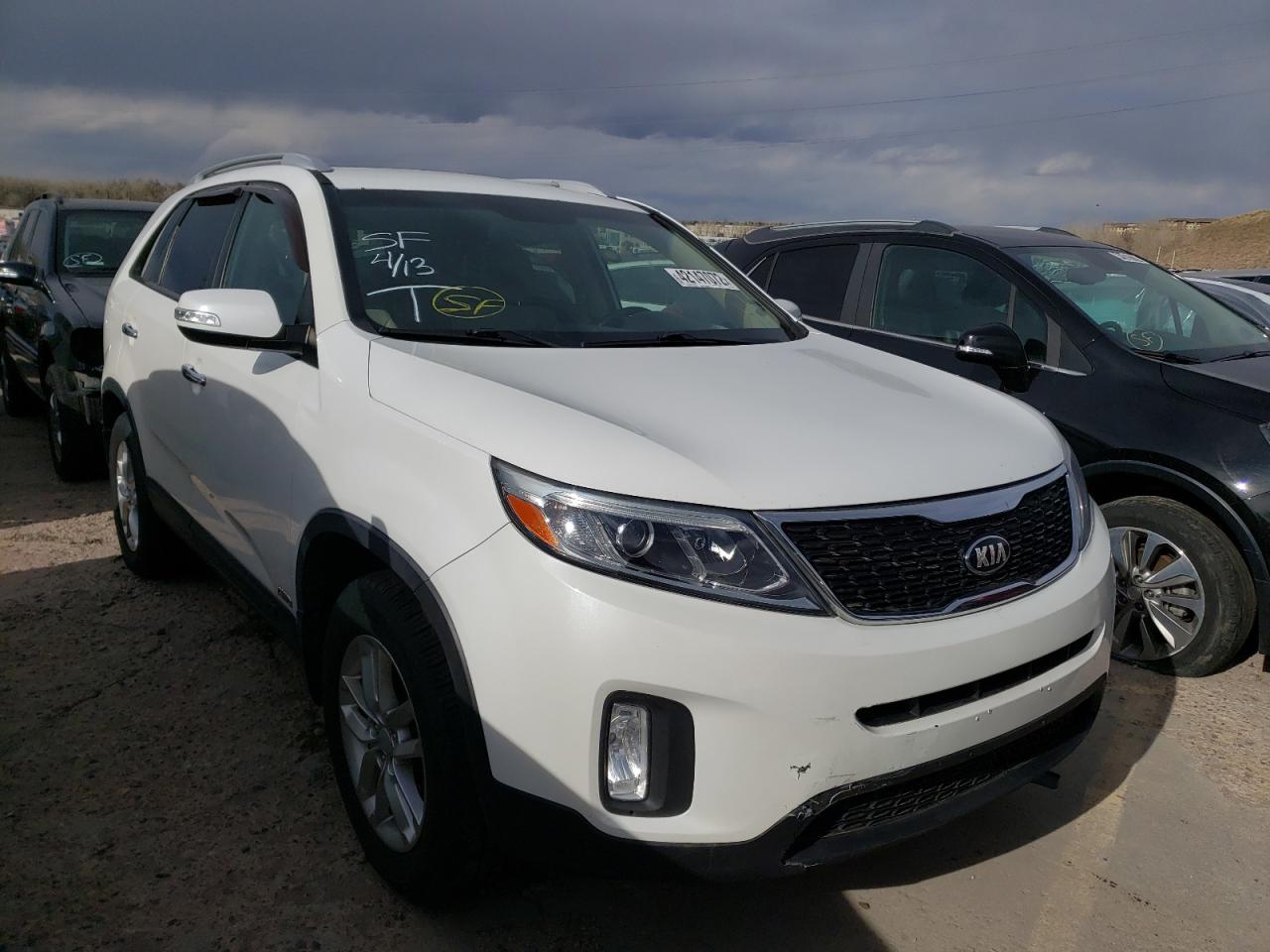 KIA SORENTO LX 2015 with VIN 5XYKTDA64FG561394 - Photo from auction