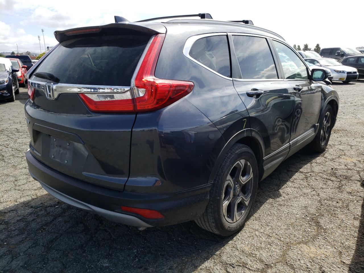 Photo 4 from auction – 2017 HONDA CR-V EX with VIN 7FARW1H53HE048590