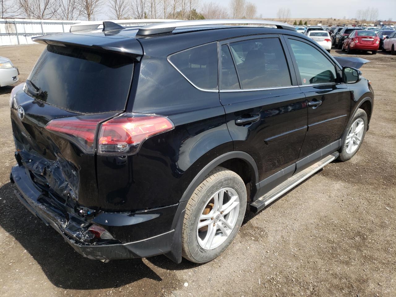 Photo 4 from auction – 2018 TOYOTA RAV4 LE with VIN 2T3ZFREV9JW497562