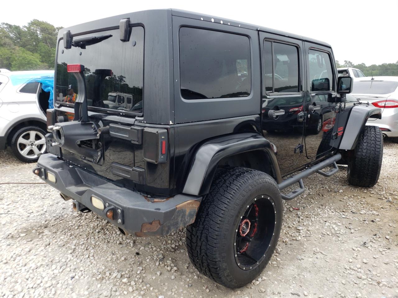 Photo 4 from auction – 2014 JEEP WRANGLER U with VIN 1C4BJWDG2EL113356