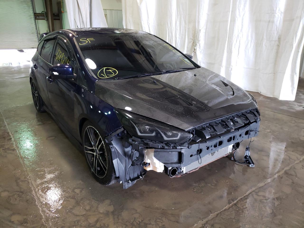 FORD FOCUS ST 2017 with VIN 1FADP3L90HL201003 - Photo from auction