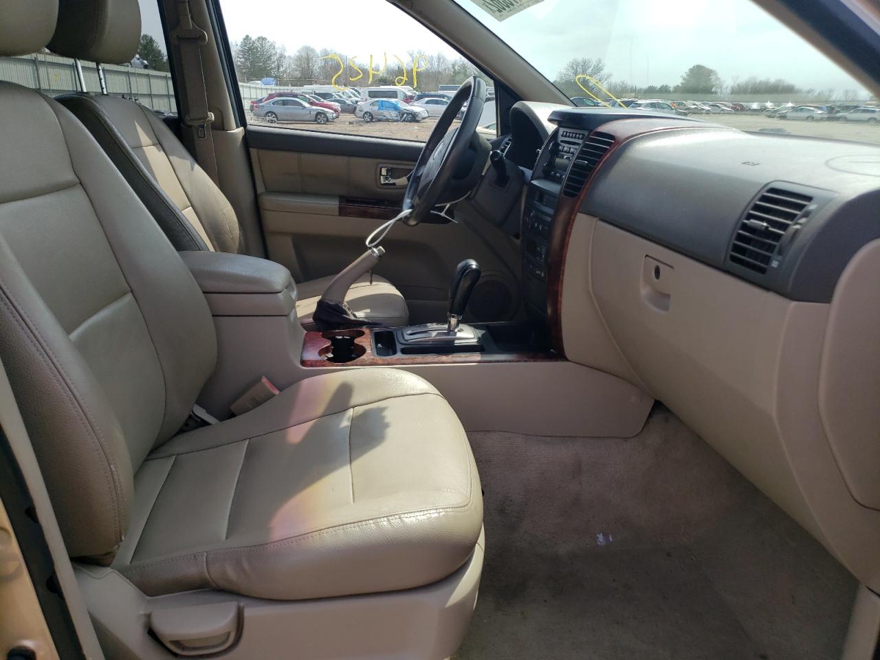 Photo 5 from auction – 2004 KIA SORENTO EX with VIN KNDJC733345268821