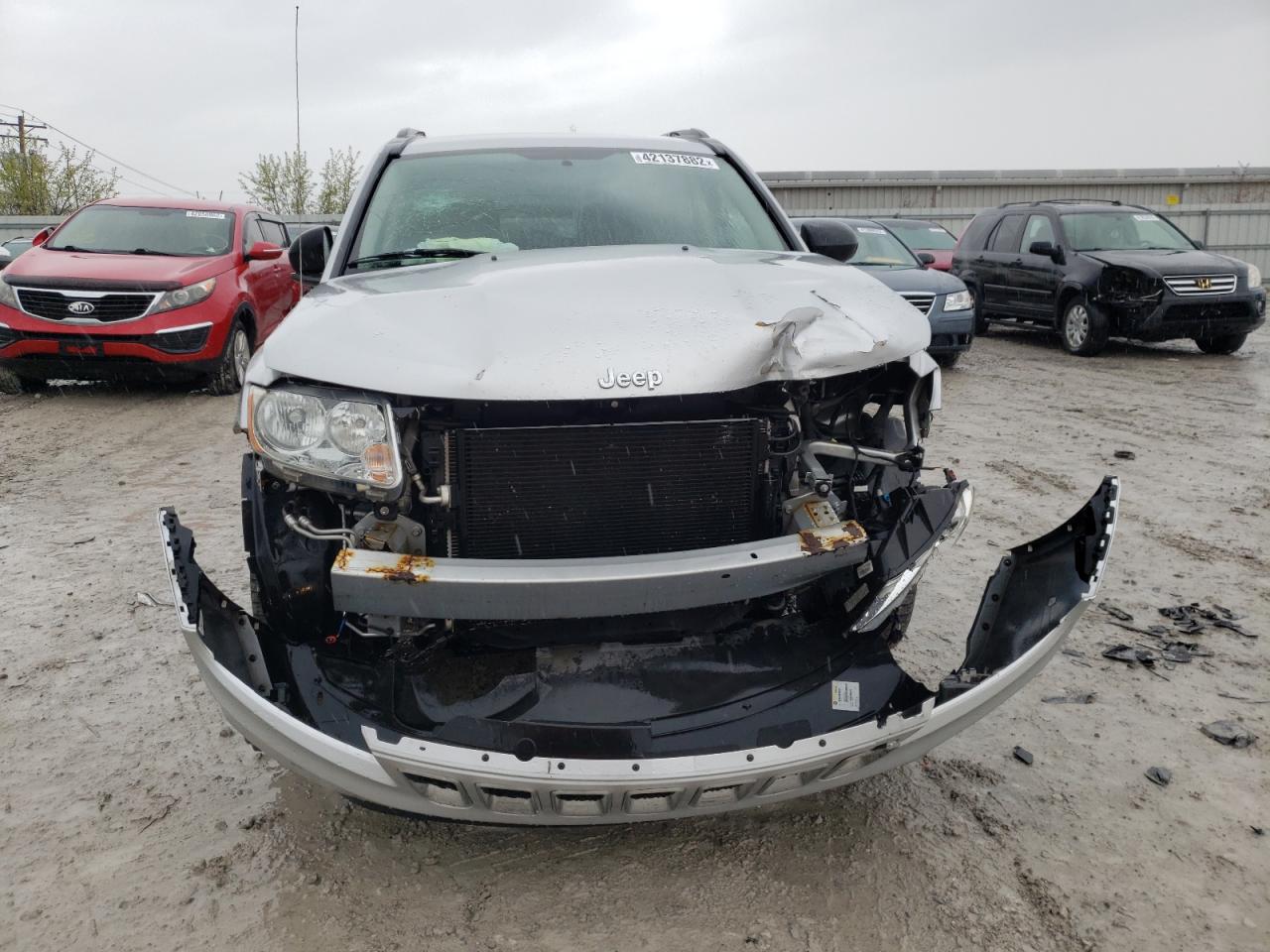 Photo 9 from auction – 2011 JEEP COMPASS SP with VIN 1J4NF1FB0BD197602