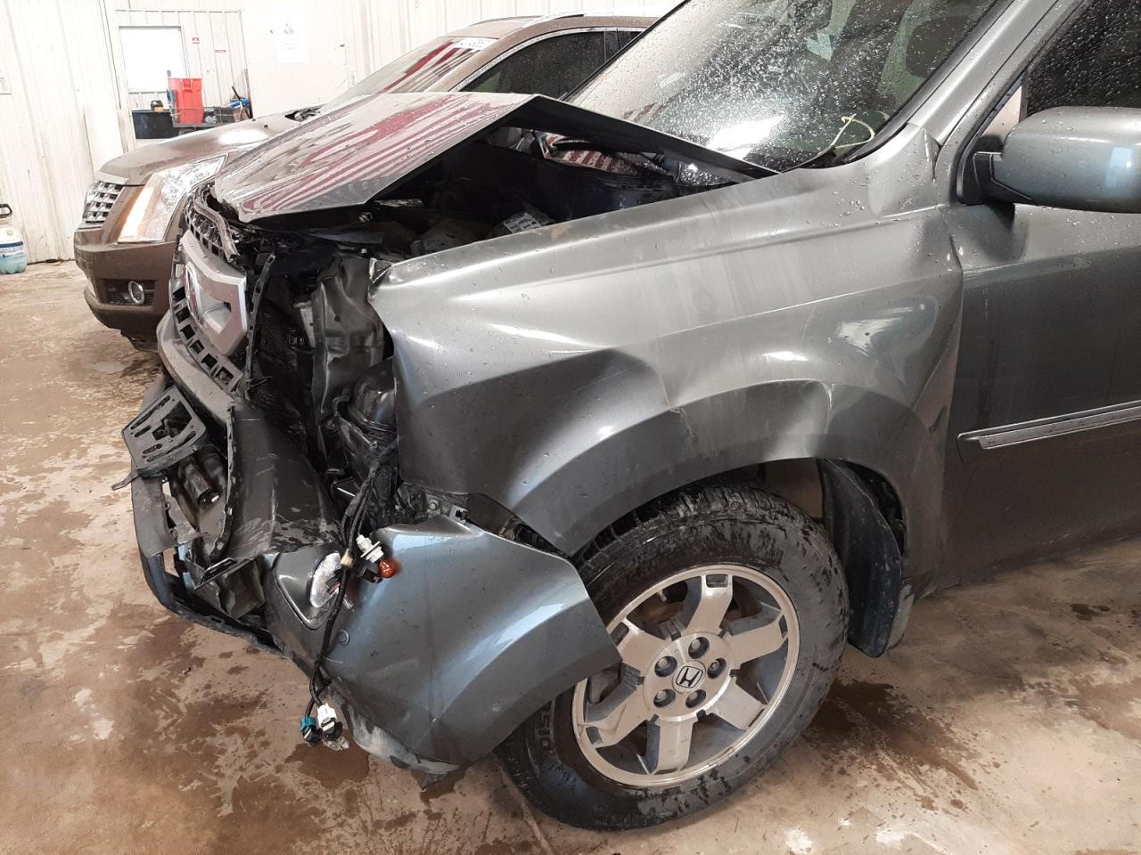 Photo 9 from auction – 2009 HONDA PILOT TOUR with VIN 5FNYF38889B007399