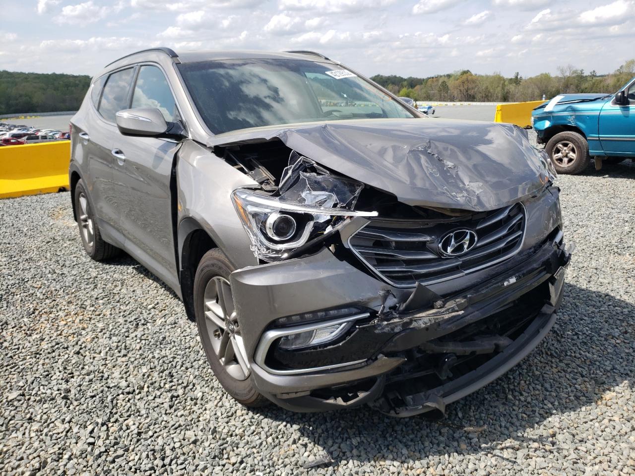 HYUNDAI SANTA FE S 2018 with VIN 5NMZU3LB1JH095387 - Photo from auction