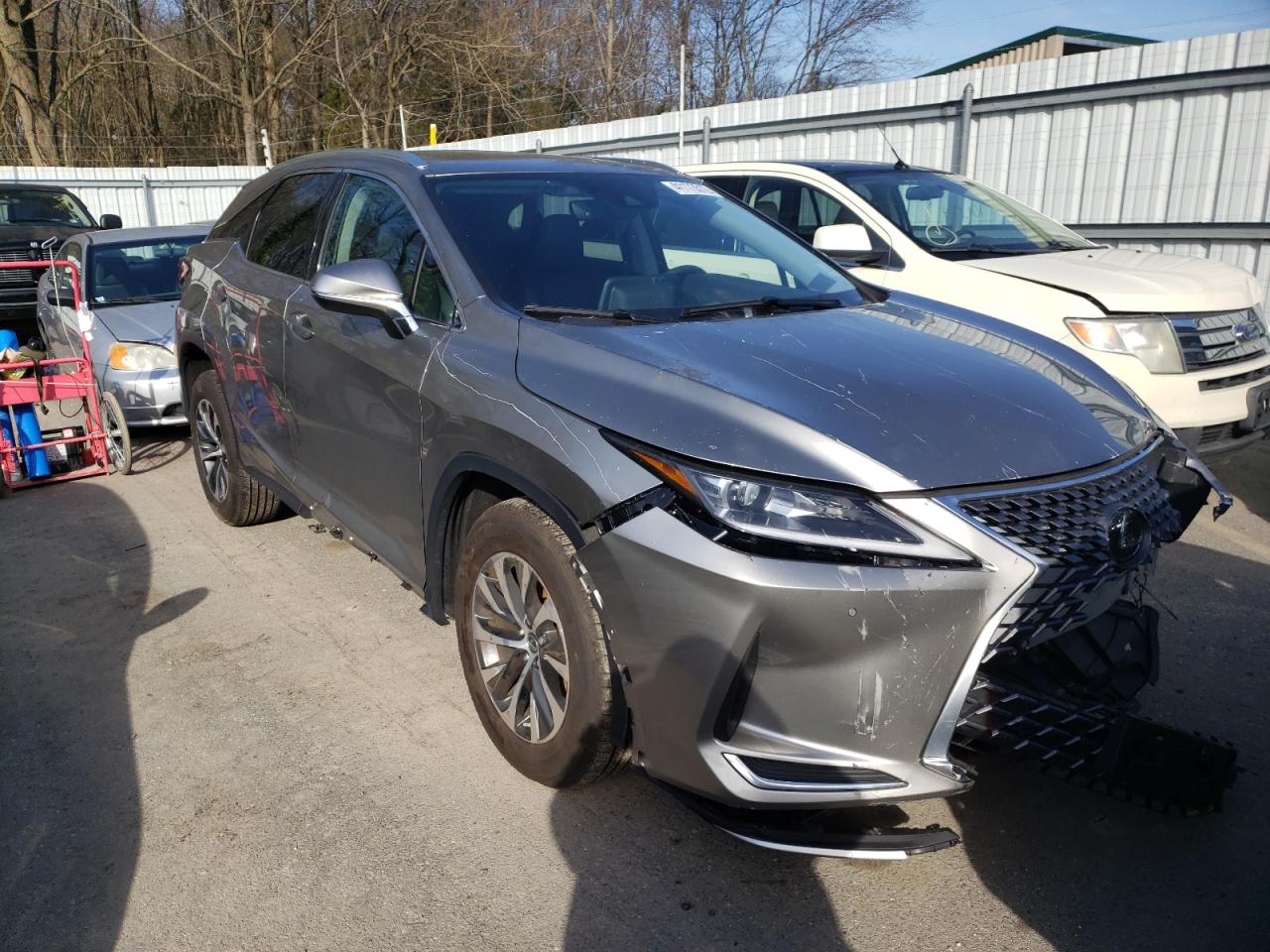 LEXUS RX 350 2021 with VIN 2T2HZMDAXMC265776 - Photo from auction