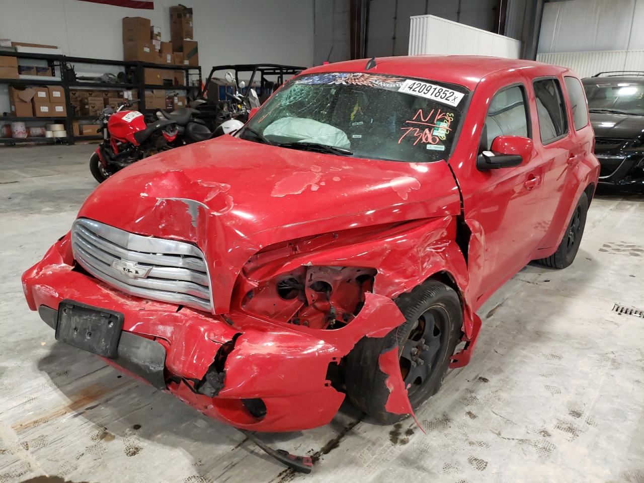 Photo 2 from auction – 2009 CHEVROLET HHR LT with VIN 3GNCA23B19S557306