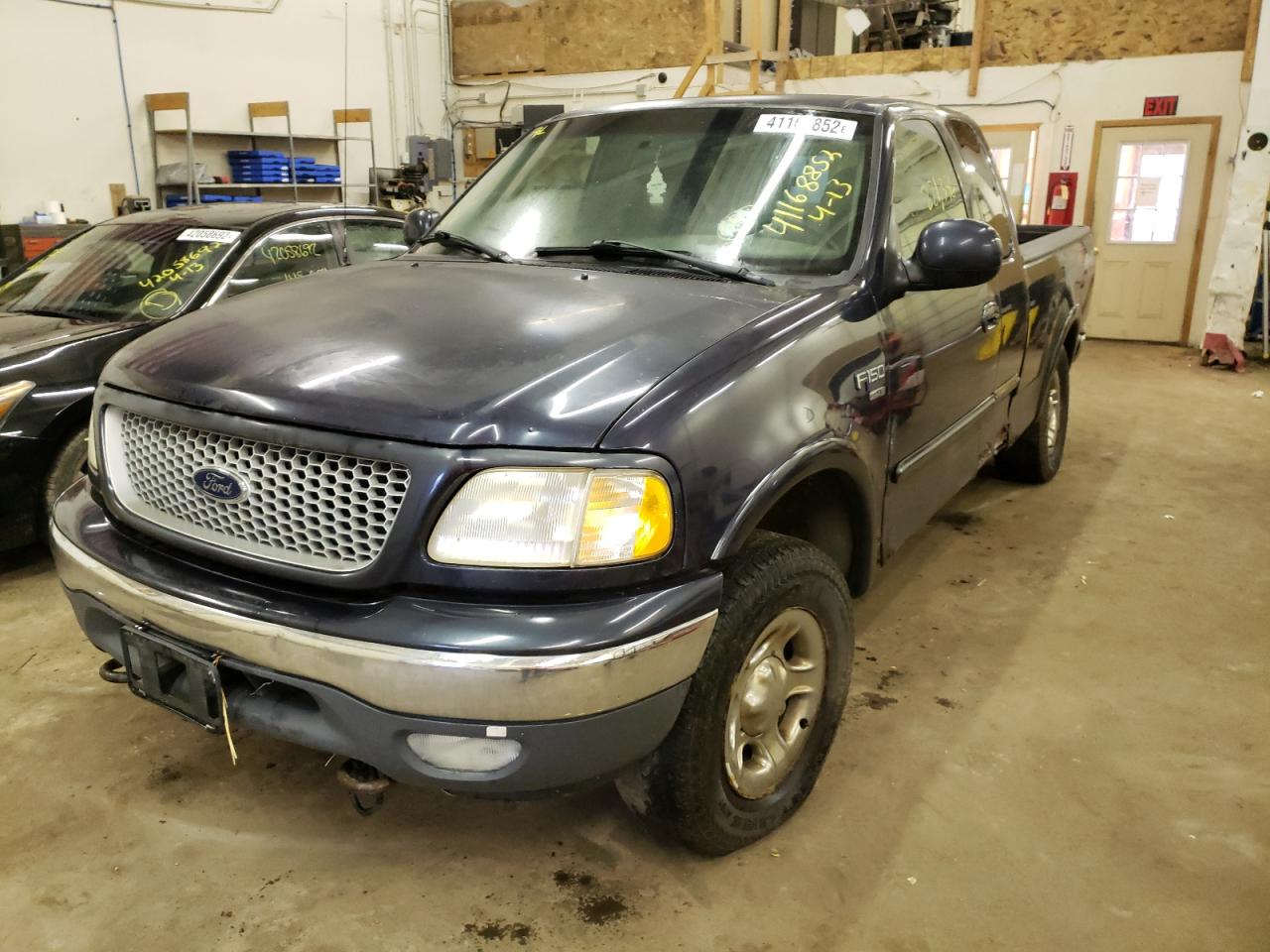 Photo 2 from auction – 1999 FORD F-150 with VIN 2FTRX18L2XCA83523