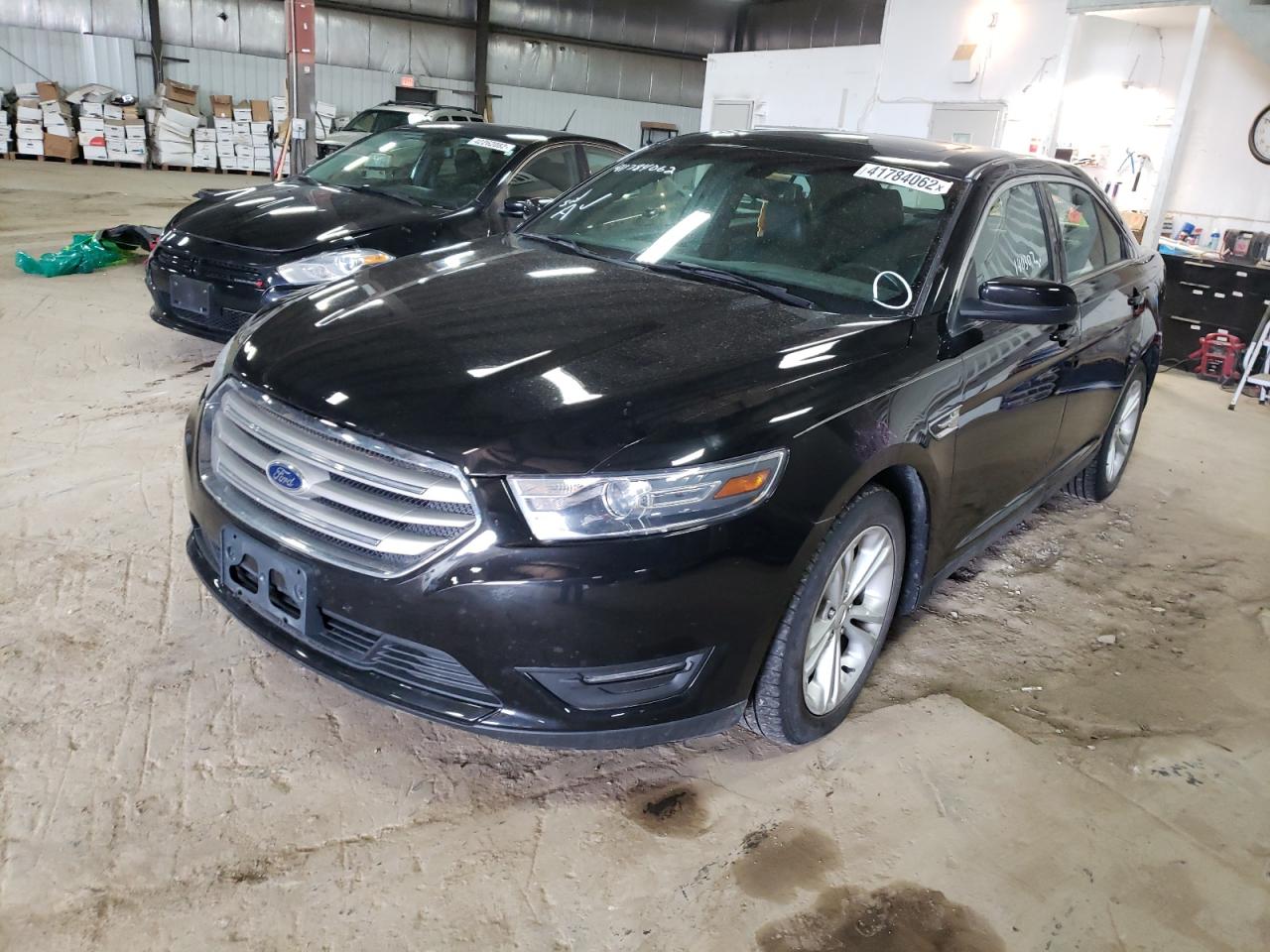 Photo 2 from auction – 2015 FORD TAURUS SEL with VIN 1FAHP2E86FG152041