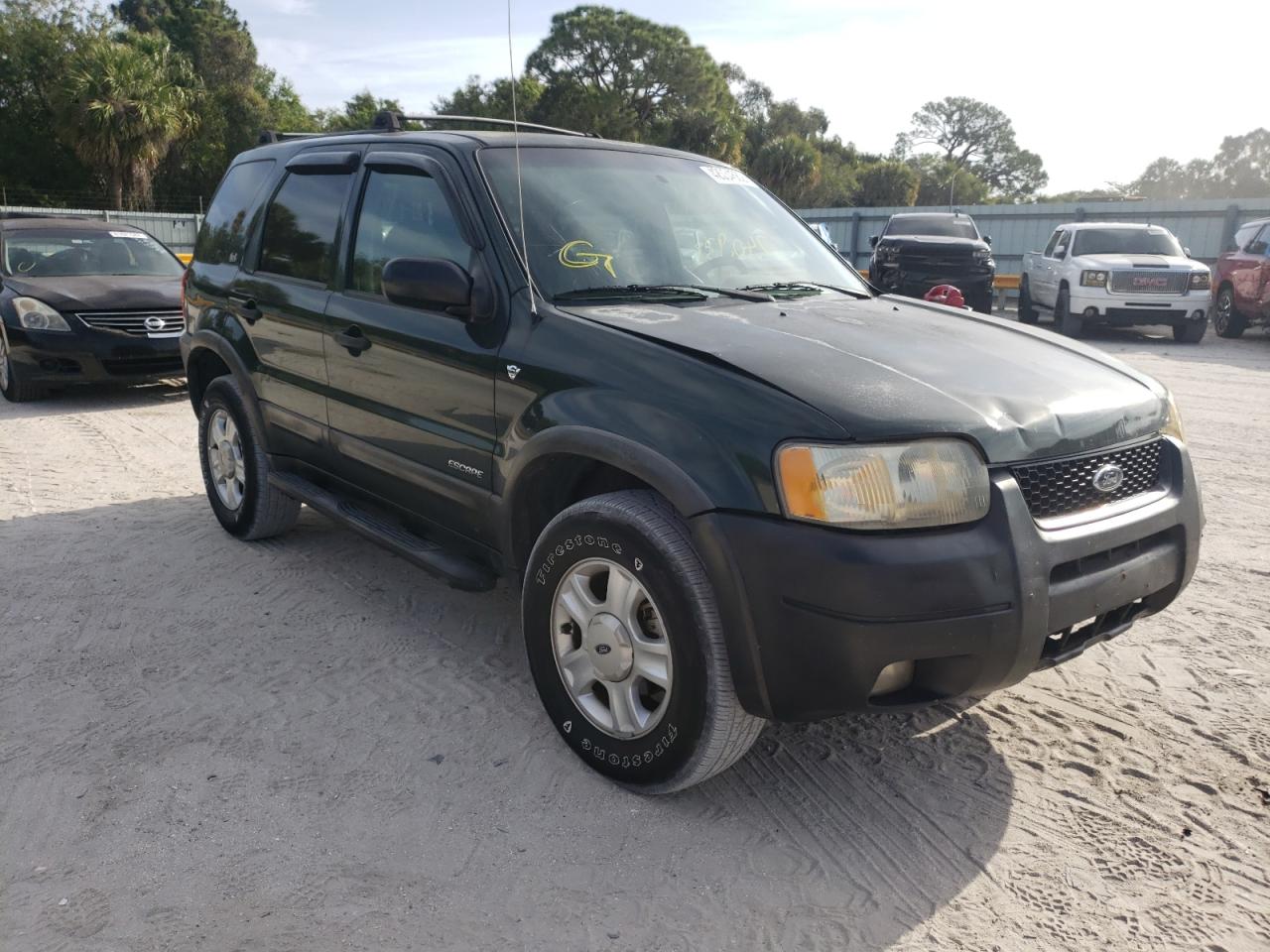 FORD ESCAPE XLT 2001 with VIN 1FMYU04101KE84344 - Photo from auction