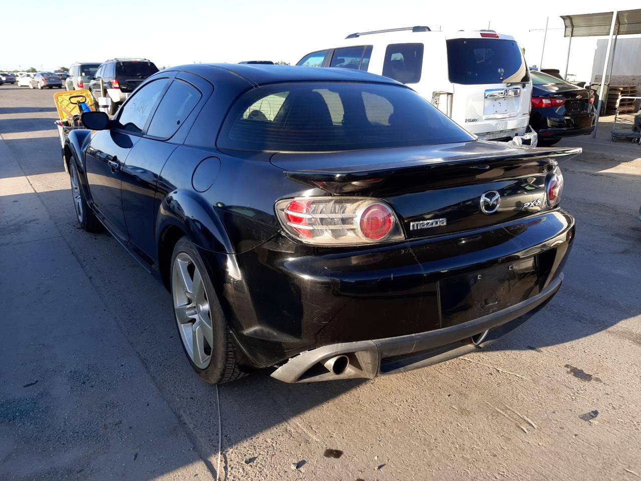 Photo 3 from auction – 2004 MAZDA RX8 with VIN JM1FE173040110294