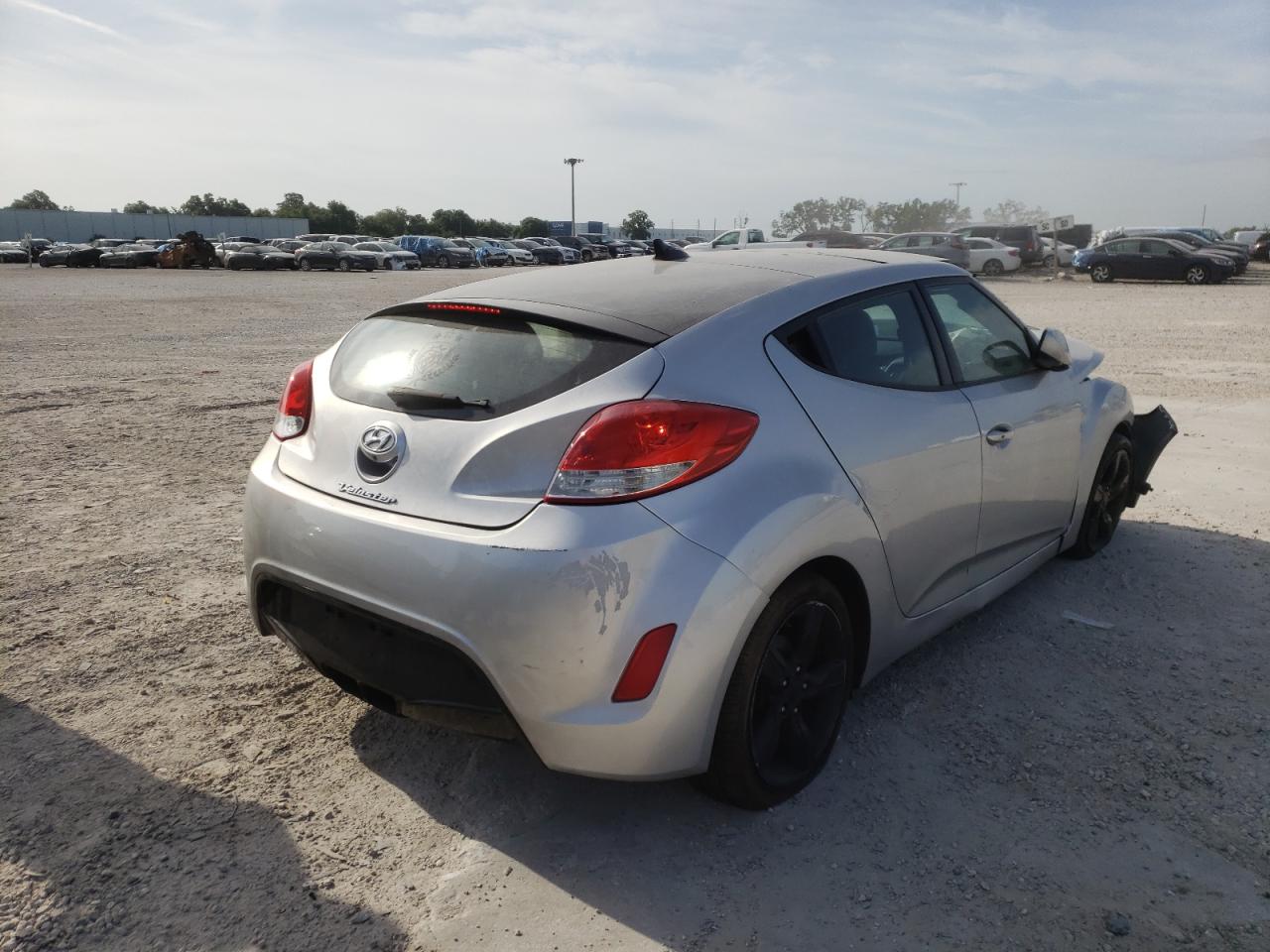 Photo 4 from auction – 2014 HYUNDAI VELOSTER with VIN KMHTC6AD7EU217050