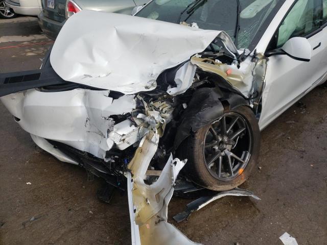 Photo 9 from auction – 2022 TESLA MODEL 3 with VIN 5YJ3E1EA8NF102743