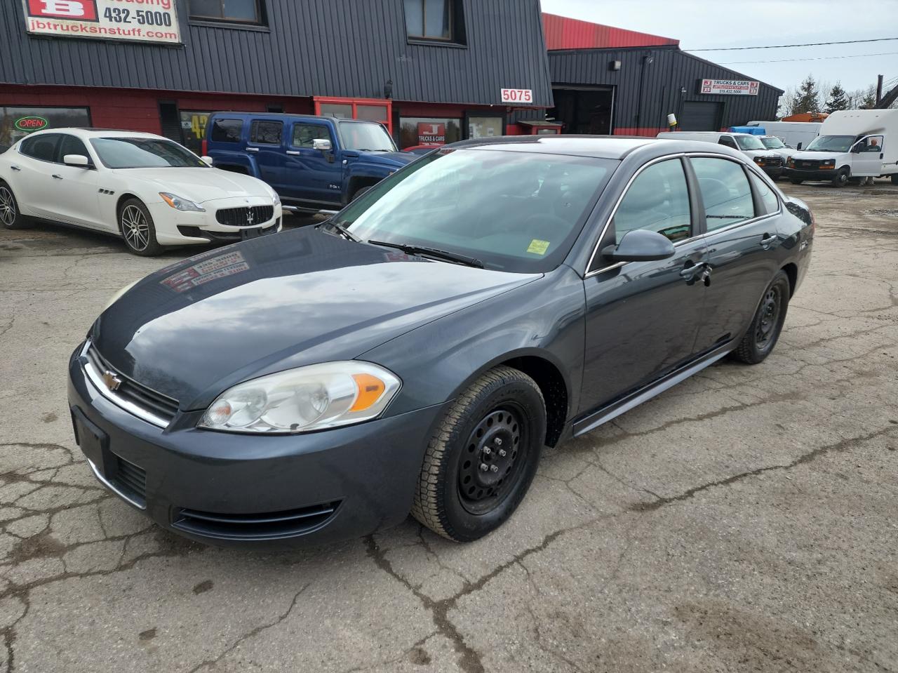 Photo 2 from auction – 2011 CHEVROLET IMPALA POL with VIN 2G1WD5EM2B1271942