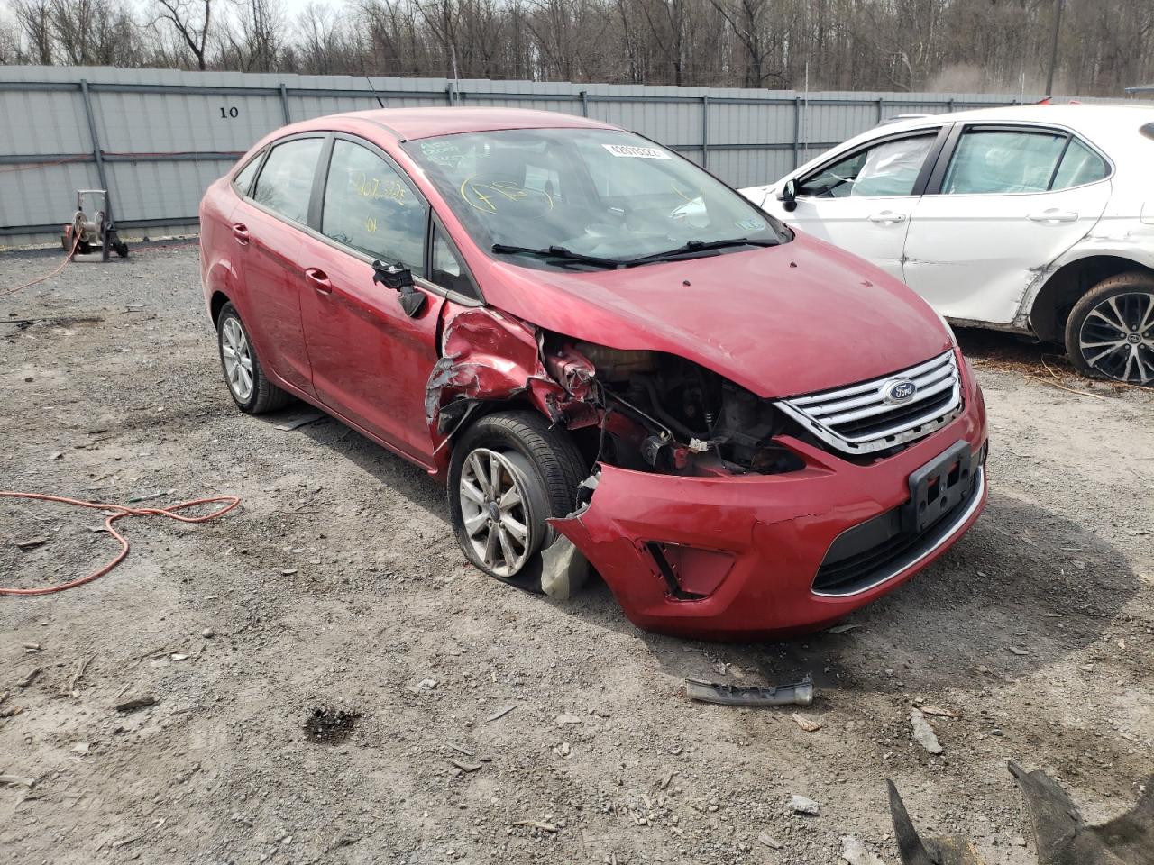 FORD FIESTA SE 2011 with VIN 3FADP4BJ4BM107102 - Photo from auction