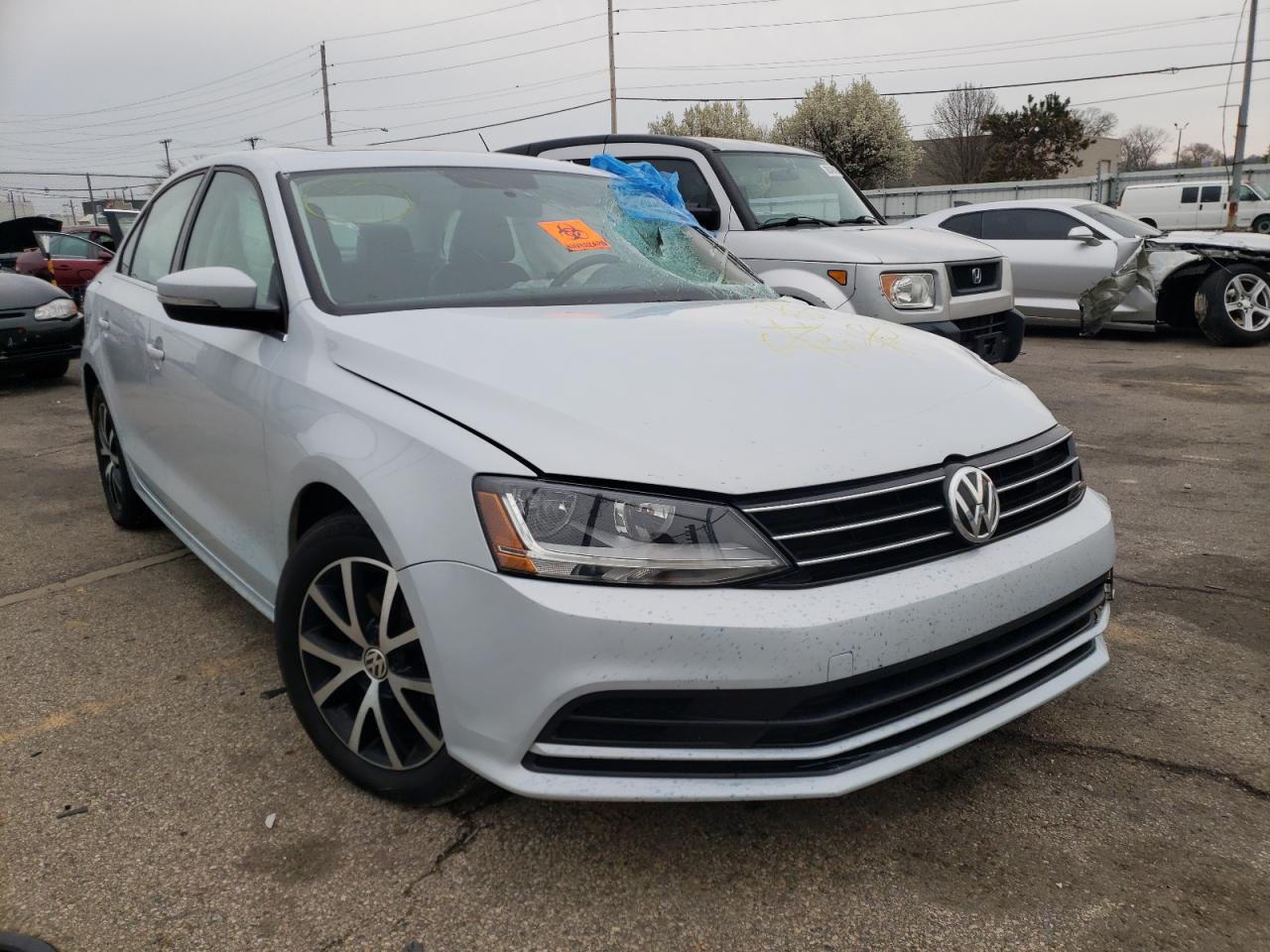 VOLKSWAGEN JETTA SE 2017 with VIN 3VWDB7AJ4HM388643 - Photo from auction