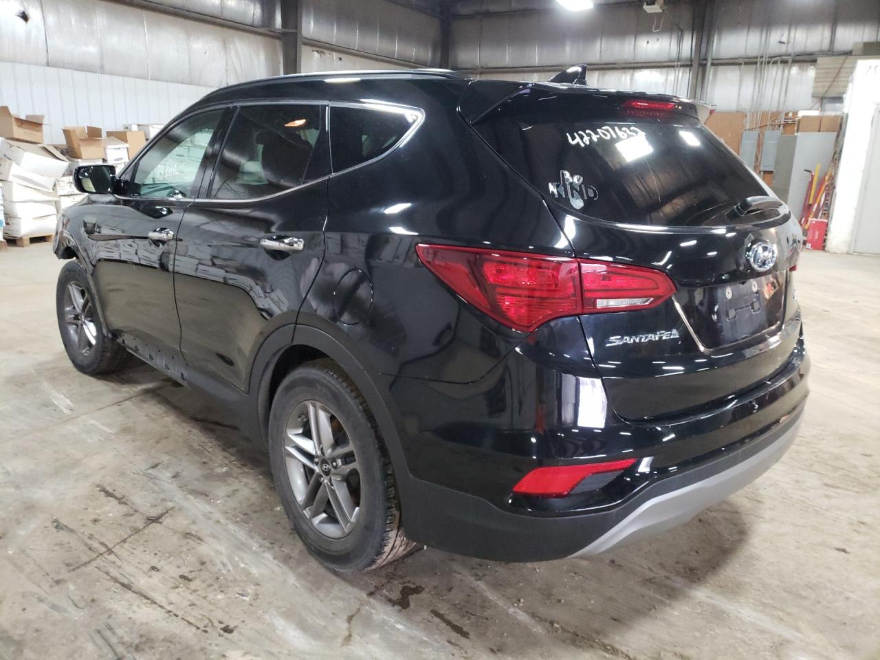 Photo 3 from auction – 2017 HYUNDAI SANTA FE S with VIN 5NMZU3LB2HH028629