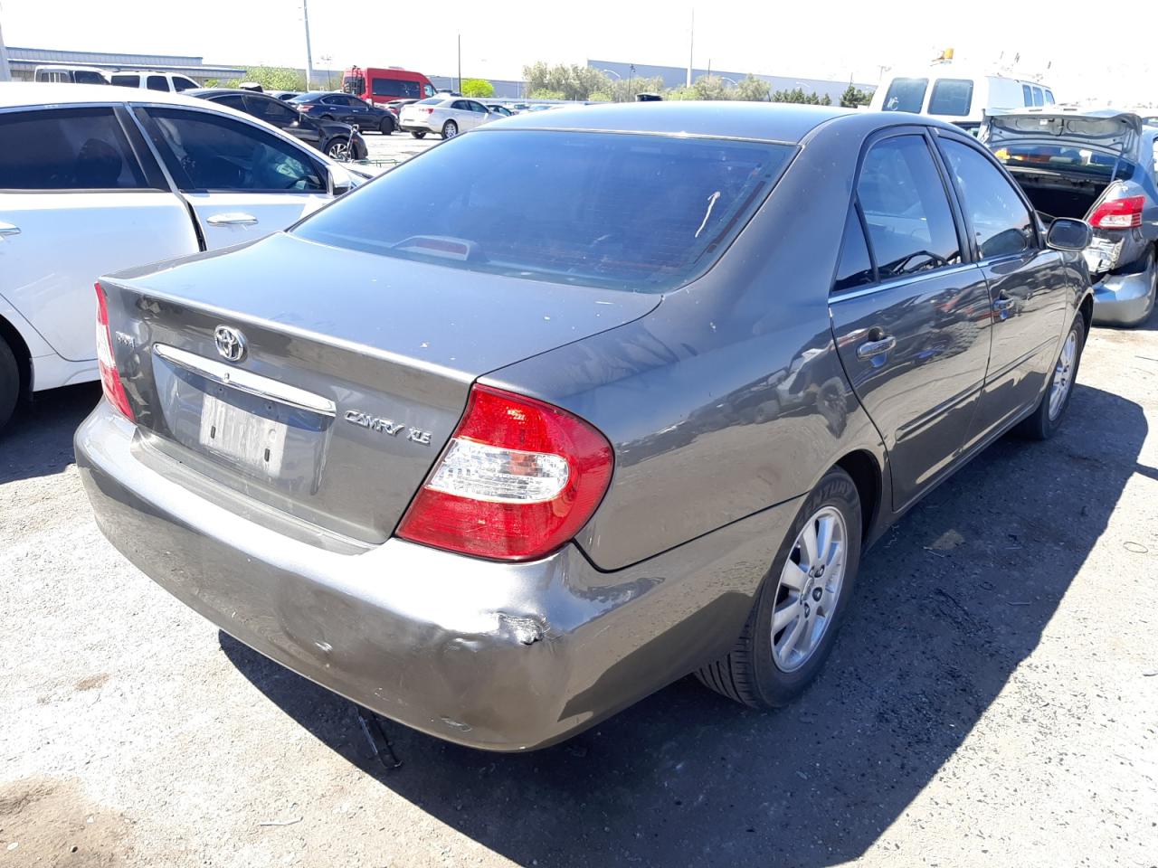 Photo 4 from auction – 2003 TOYOTA CAMRY LE with VIN JTDBE32KX30235813