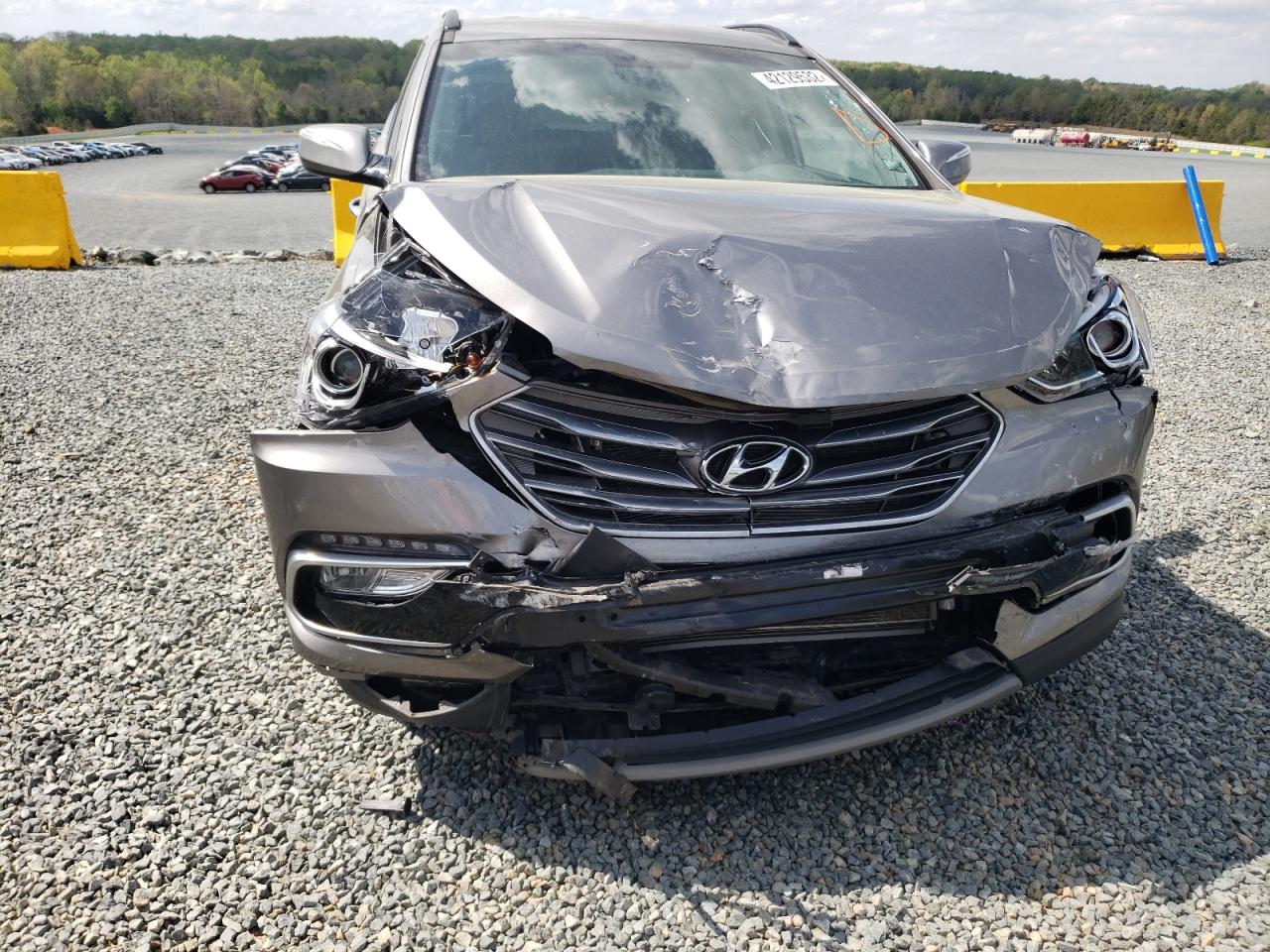 Photo 9 from auction – 2018 HYUNDAI SANTA FE S with VIN 5NMZU3LB1JH095387