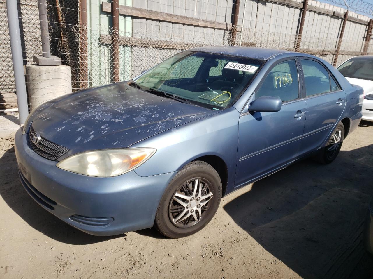 Photo 2 from auction – 2003 TOYOTA CAMRY LE with VIN 4T1BE30K13U717092