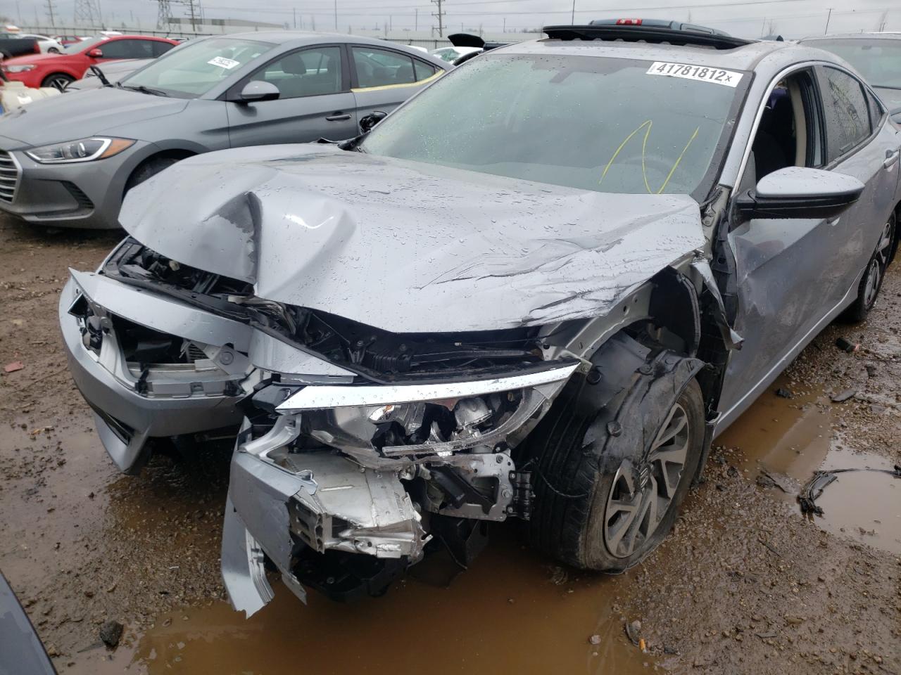 Photo 9 from auction – 2018 HONDA CIVIC EX with VIN 19XFC2F75JE027494