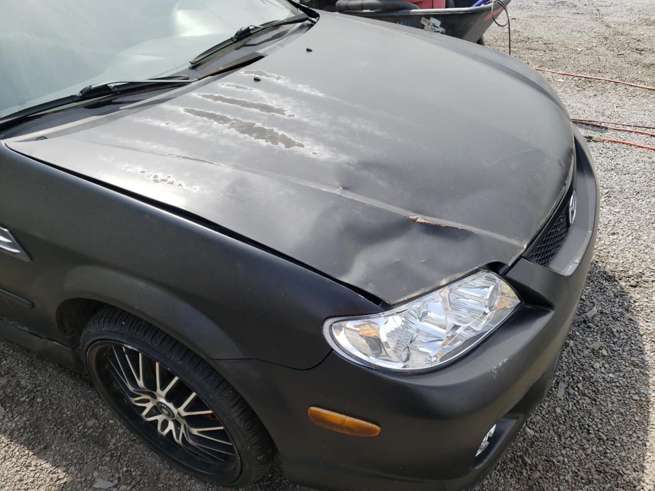 Photo 9 from auction – 2002 MAZDA PROTEGE PR with VIN JM1BJ245121478450